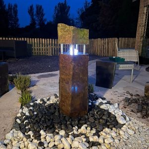 'Beacon of Light' basalt column lantern water feature