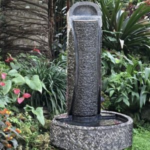 'la Cicada' self contained carved solid Granite Column water fountain feature